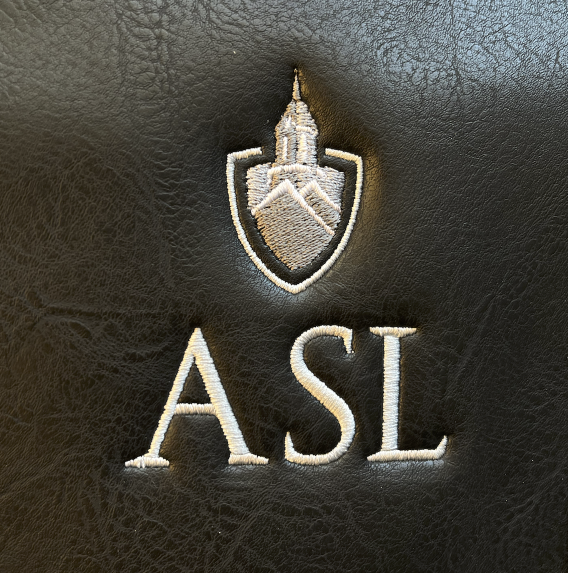 Embroidered ASL Leather Backpacks